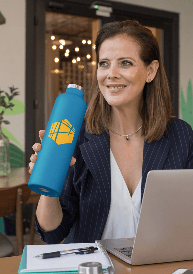 mockup-of-a-woman-drinking-from-an-aluminum-bottle-while-working-33486.png