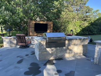 outdoor TV and fire pit